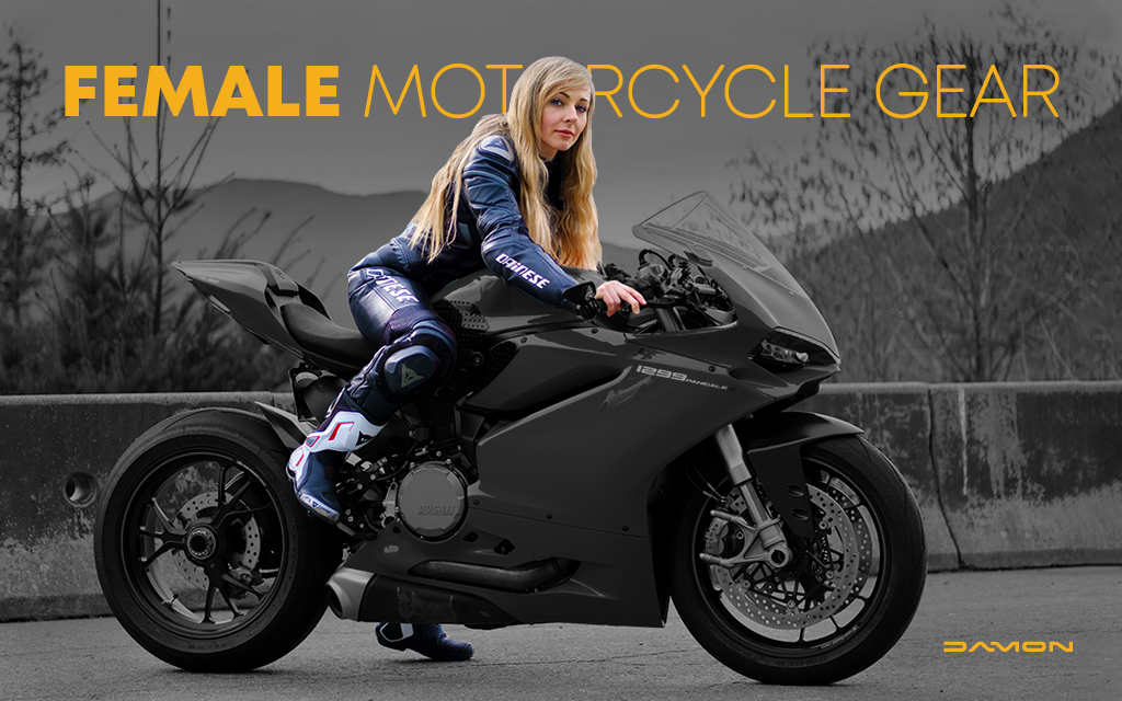 Blonde motorcycle rider wearing women gear