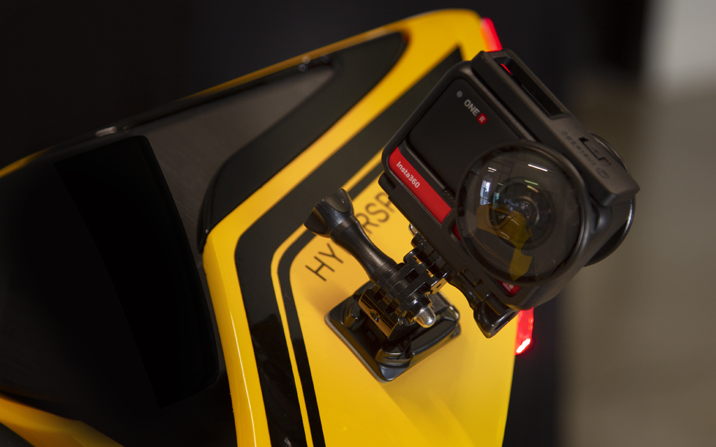 Close up of an Insta360 camera on a yellow Damon HyperSport HS